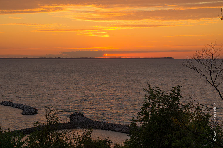 Sonnenuntergang über Kap Arkona von Lohme gesehen